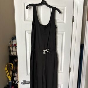 Brand new vuori jumpsuit. Black, size small, tags still on.